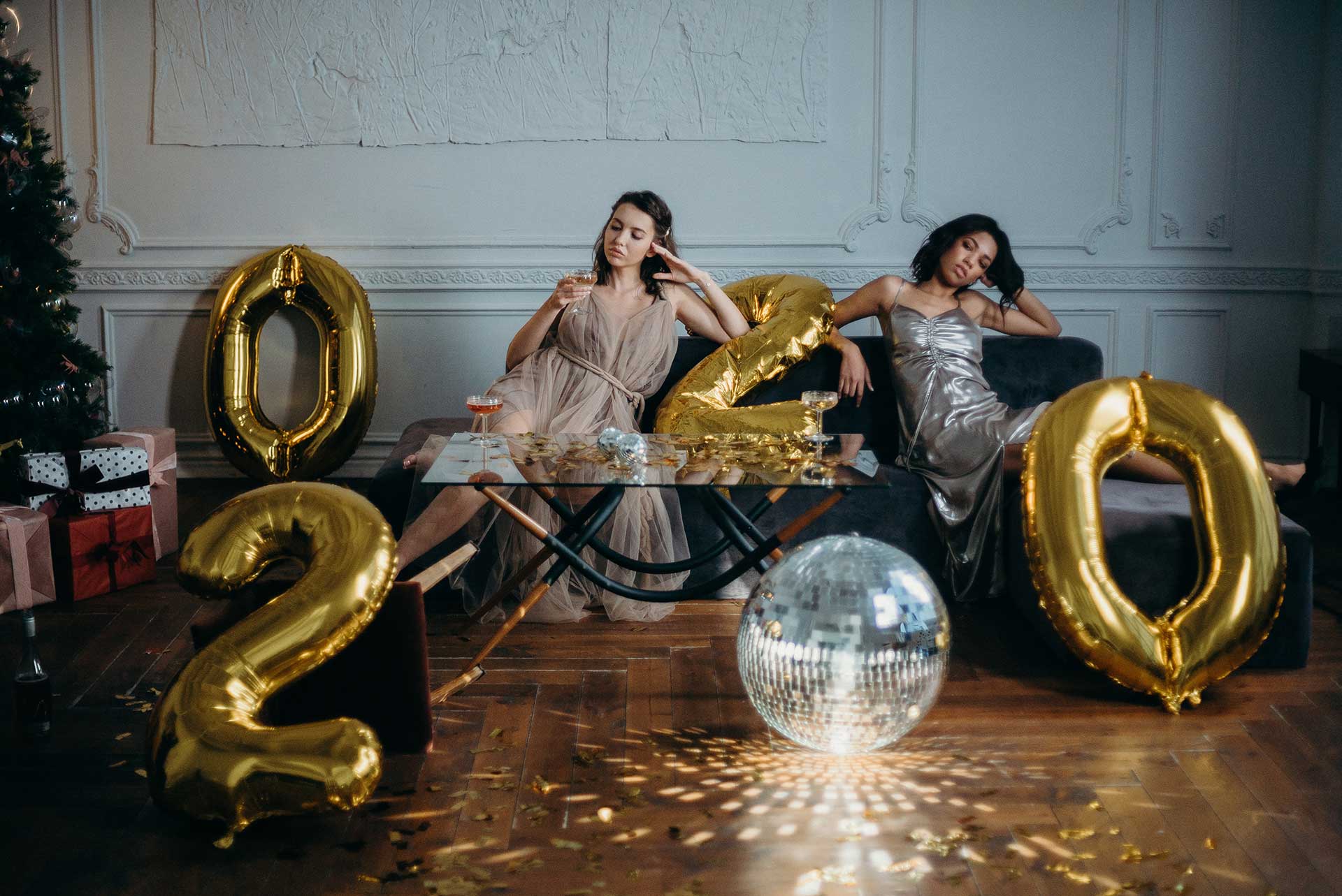 photo of women sitting on couch 3402529
